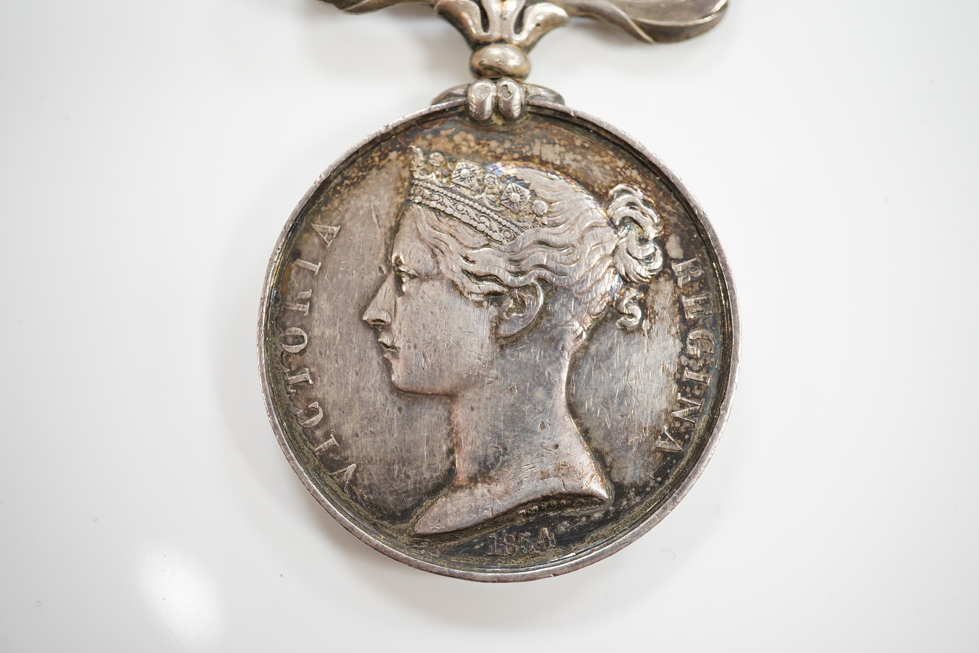 A Crimea Medal with Alma, Inkermann and Sebastopol clasps to a French recipient 721 Robert 1 G.